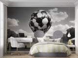 Modern football decor in playroom showing full wall installation