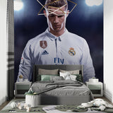 Football wallpaper installation in sports bar showing dramatic lighting