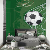 Football goal mural wallpaper in sports fan home office setup