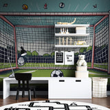 Football themed wall mural installation in modern home gym space