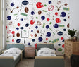 Football wallpaper mural bringing sports energy to a modern teen bedroom with gaming setup and blue accents