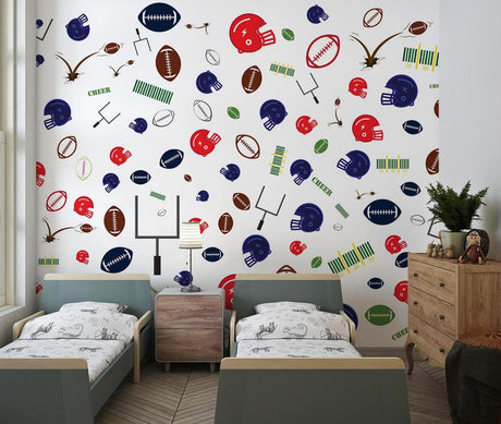 Football wallpaper mural bringing sports energy to a modern teen bedroom with gaming setup and blue accents