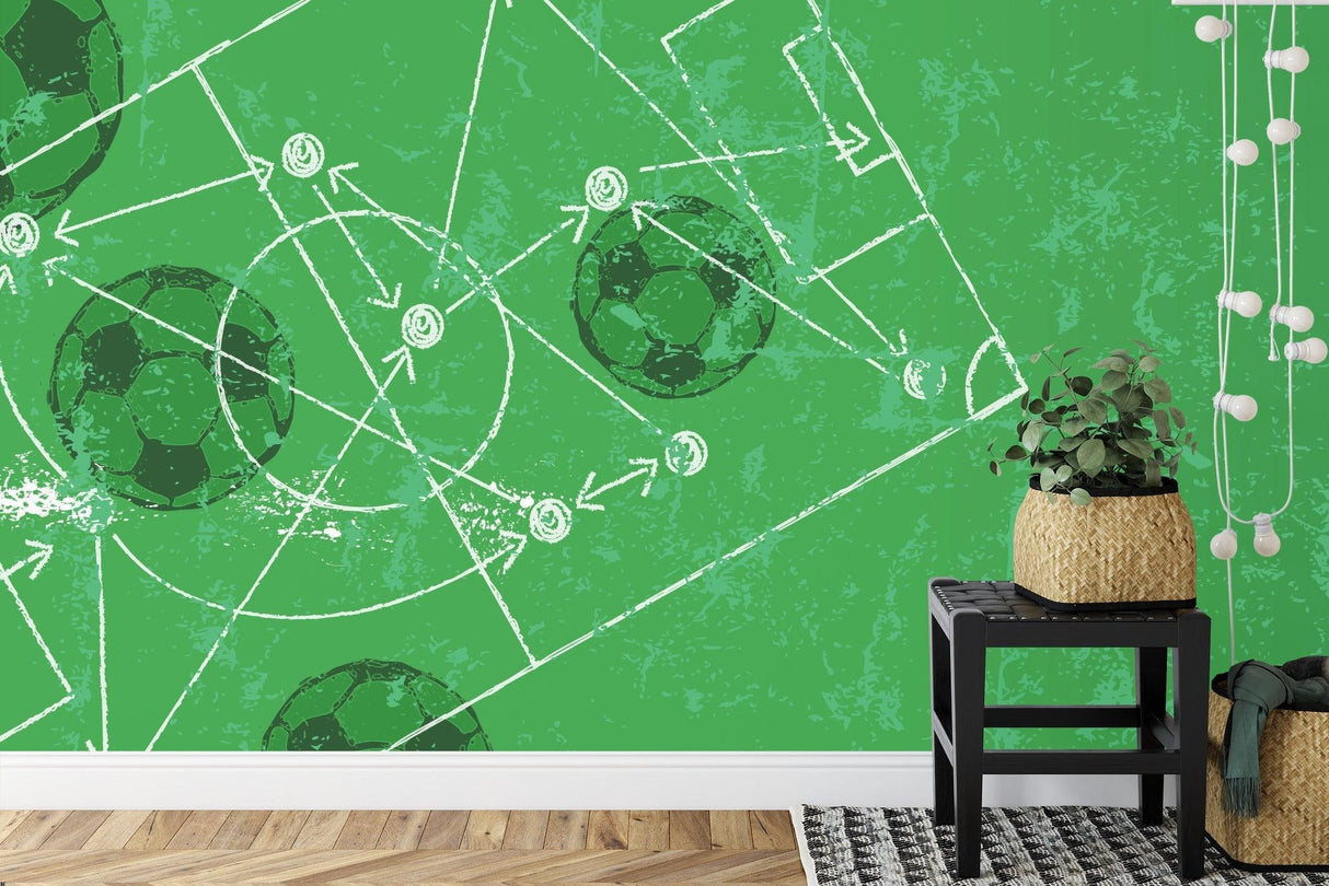 Soccer coaching mural installed in youth training facility with white tactical lines on green