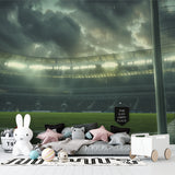 Sports arena wallpaper creating depth in teen bedroom, stadium lights glowing through storm clouds