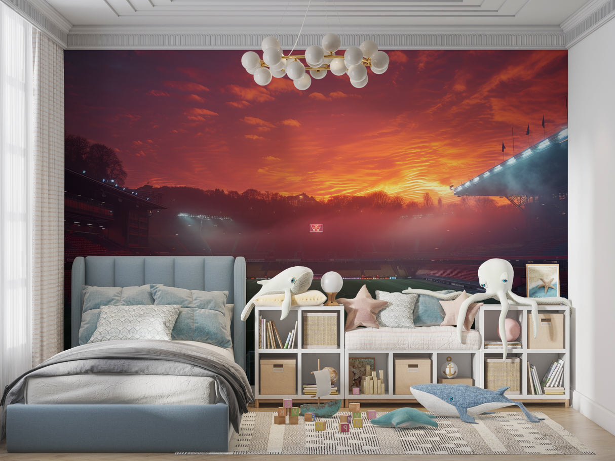 Man cave transformed with football stadium wall mural at sunset