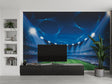 Football stadium wallpaper creating depth in modern living room with blue ambient lighting effects