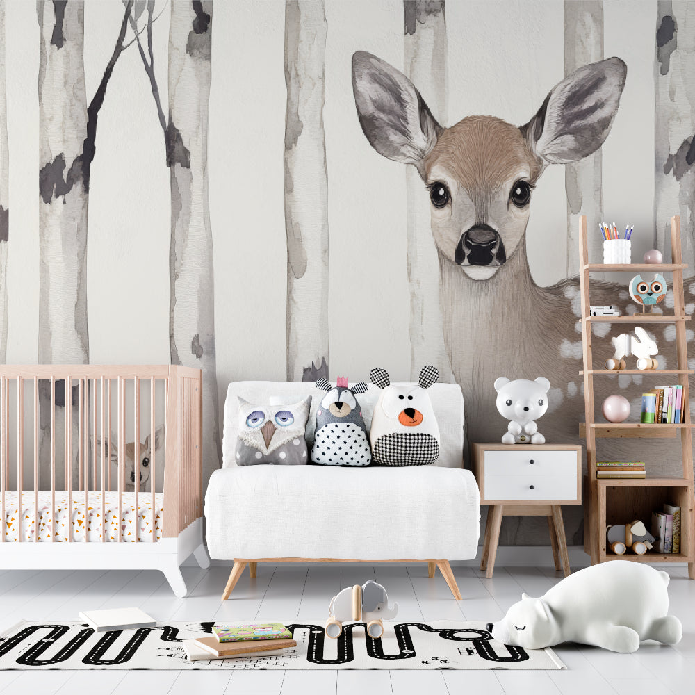 Forest animal wallpaper with baby deer and birch trees creating a cozy atmosphere in a modern nursery