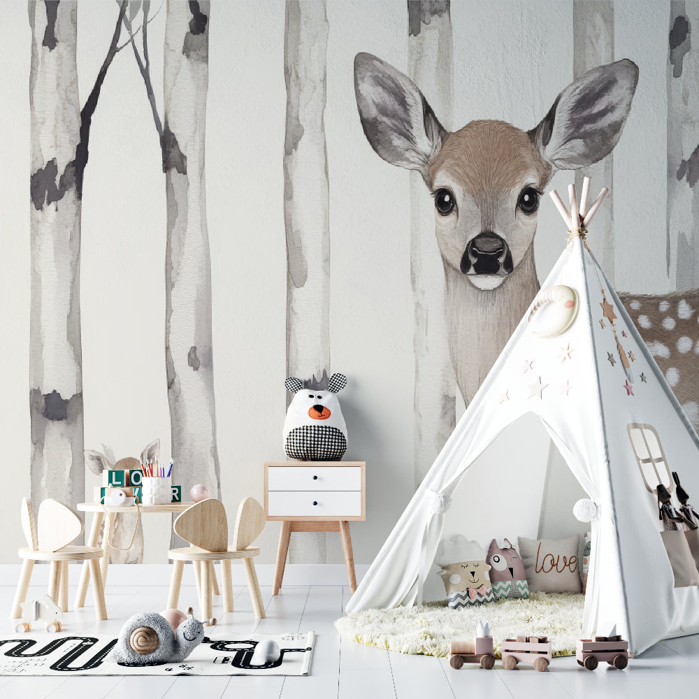 Woodland deer wallpaper bringing natural charm to a child's reading nook