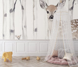 Baby deer wallpaper transforming a toddler's bedroom into a peaceful forest sanctuary