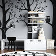 Black and white forest animals wallpaper creating a cozy atmosphere in a modern nursery