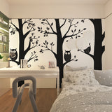 Black and white owl wallpaper transforming a master bedroom