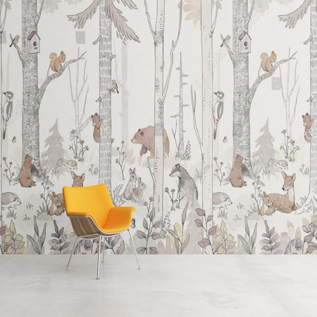 Forest animals wallpaper creating a cozy atmosphere in a bright nursery with white furniture and pink accents