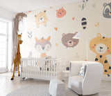 Woodland wallpaper in toddler's room with matching furniture