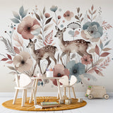 Forest animals wallpaper in bright nursery with white furniture, showing deer and pastel florals