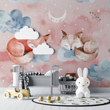 Woodland nursery featuring fox wallpaper with matching furniture and decor