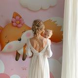 Pink fox wallpaper mural in a modern children's bedroom with white furniture
