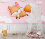 Forest animal wallpaper creating a sweet accent wall in a girl's playroom
