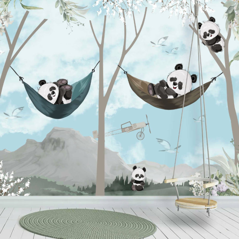 Woodland creatures mural wallpaper bringing charm to a child's reading corner