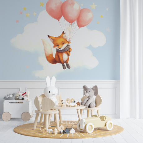 Flying Fox nursery wallpaper in a cozy reading nook with rocking chair and soft lighting
