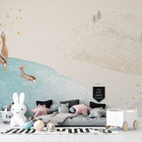Forest animal wallpaper creating serene atmosphere in baby room with golden star details