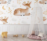 Forest theme wallpaper installed in a baby room with neutral colors and natural elements