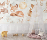 Forest themed wall mural in toddler bedroom showing full wall application