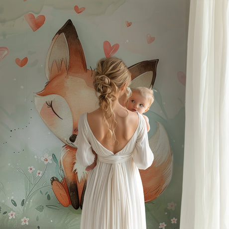Forest fox wallpaper styled in a modern nursery with white furniture and soft pink accents