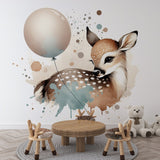 Forest animal wallpaper with watercolor deer and balloon styled in a cozy nursery with natural wood furniture and soft textiles