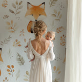 Watercolor forest animals mural in a gender-neutral nursery setting