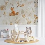 Watercolor woodland mural in reading nook with natural wood elements