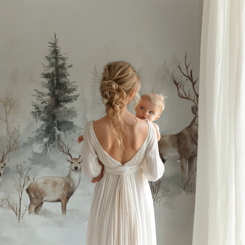 Forest deer wallpaper in a modern living room showing three majestic deer among misty pine trees