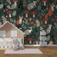 Forest animals wallpaper with foxes and mushrooms creating a magical woodland scene in a modern nursery with natural light