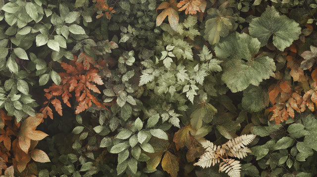 Forest mural wallpaper with autumn leaves shown in a bright living room setting, green and terracotta tones creating depth