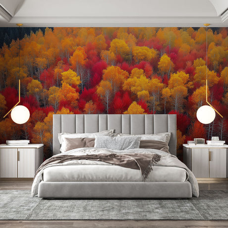 Autumn forest wallpaper creating a cozy atmosphere in modern living room with red and gold leaf details