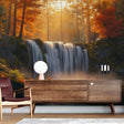 Forest waterfall wallpaper creating depth in a modern living room, warm sunset tones complement contemporary furniture