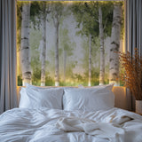 Green forest mural creating a natural focal point in an entrance hall