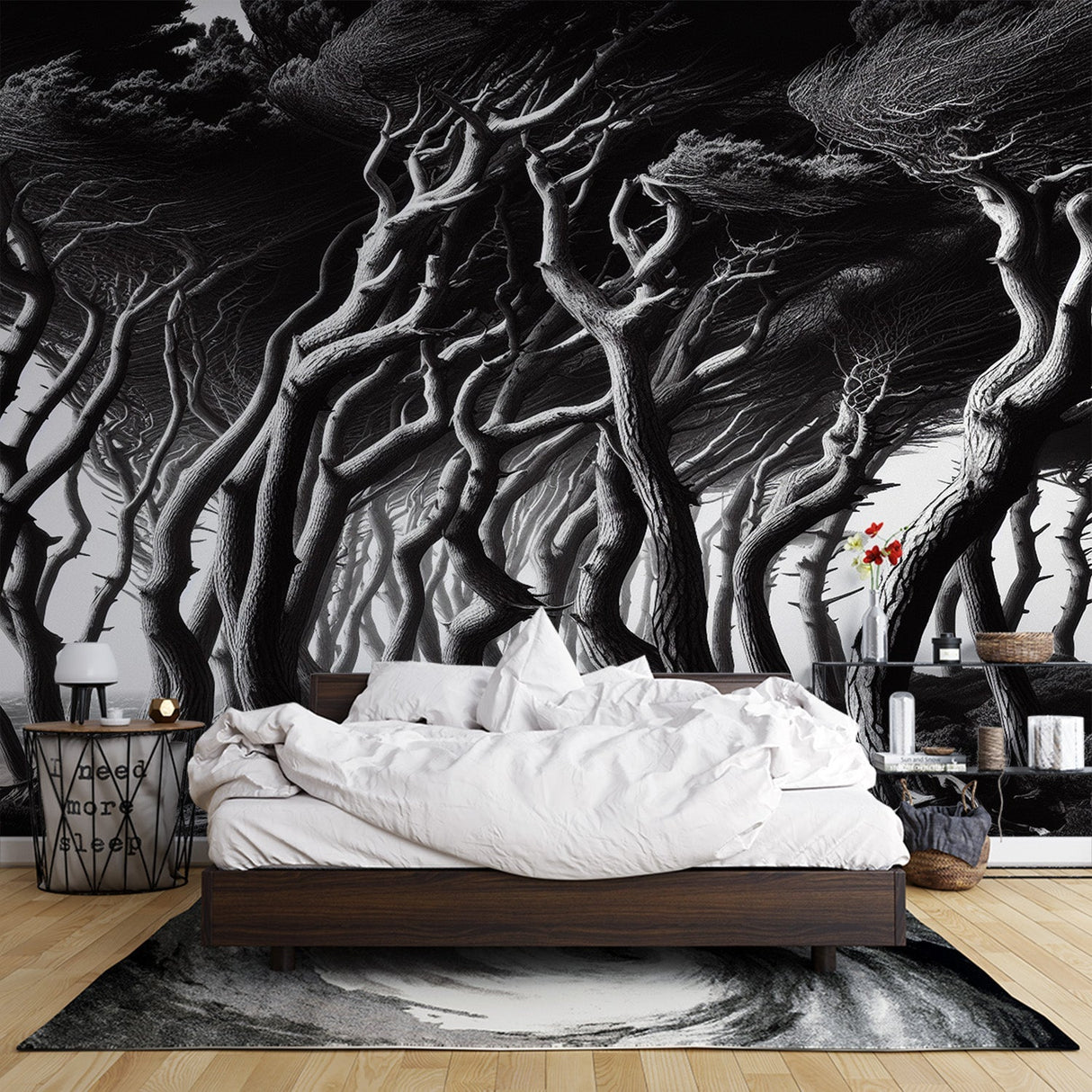 Black and white forest wallpaper creating depth in a modern living room with minimalist furniture