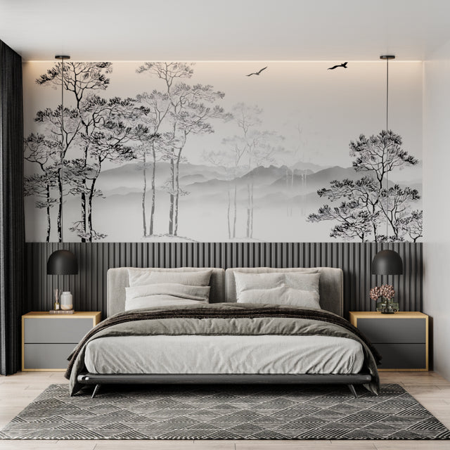 Black and white forest wallpaper in modern living room with gray sofa