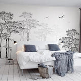Reading nook with peaceful tree mural backdrop