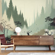 Forest wallpaper with deer silhouettes creating a cozy atmosphere in a modern living room with minimal furniture