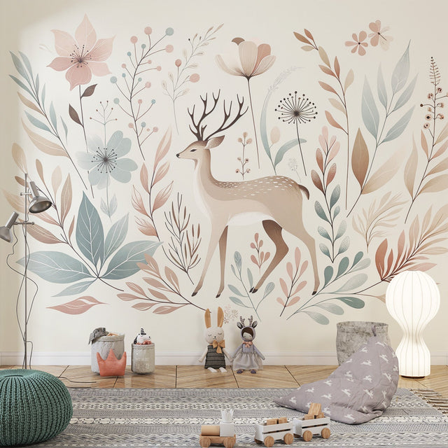 Forest deer wallpaper in a bright nursery with white furniture and soft pink accents