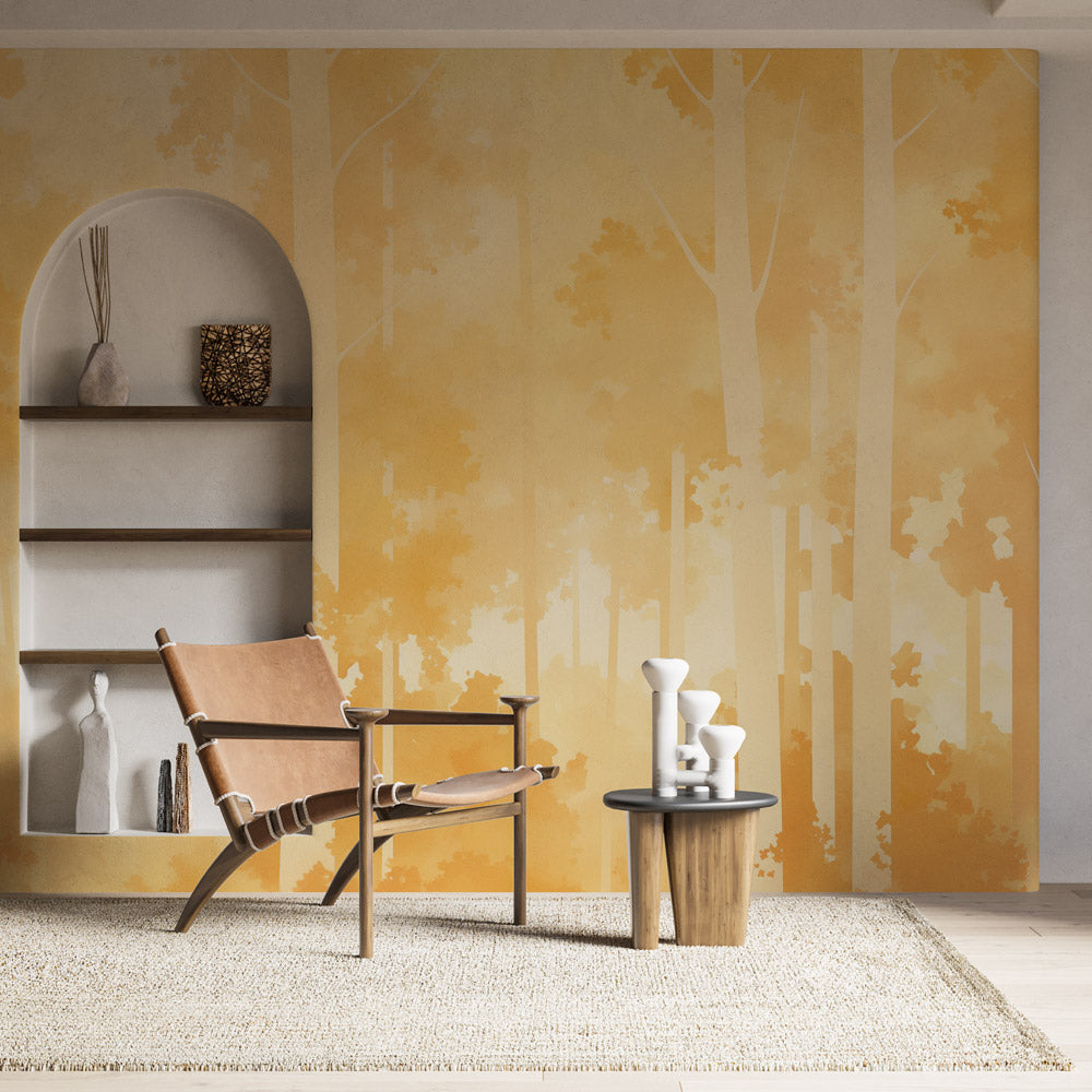 Golden forest wallpaper creating a warm glow in modern living room with minimal furniture