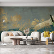 Golden forest wallpaper mural in modern living room with gray sofa and natural light highlighting metallic details