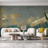 Golden forest wallpaper mural in modern living room with gray sofa and natural light highlighting metallic details