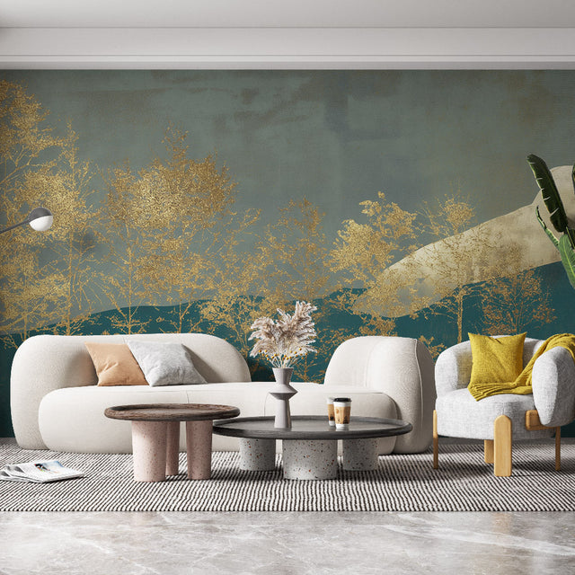 Golden forest wallpaper mural in modern living room with gray sofa and natural light highlighting metallic details