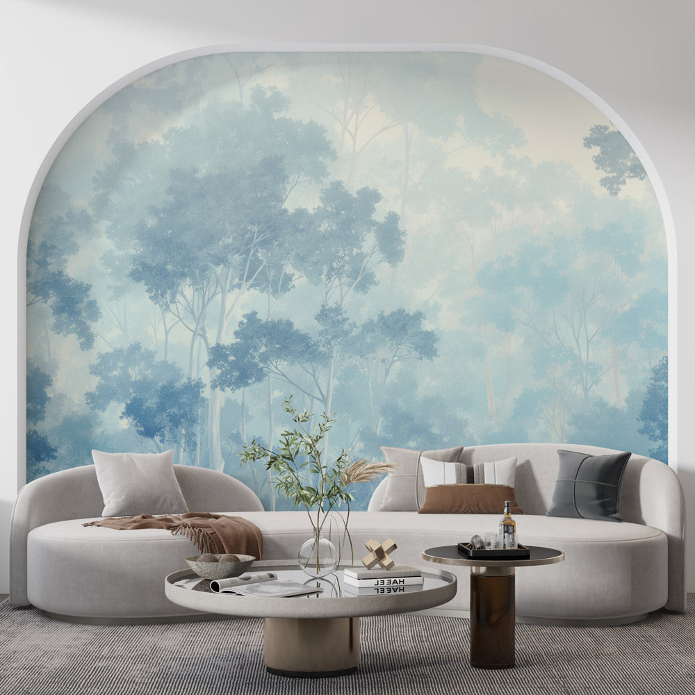 Misty forest wallpaper creating depth in a modern living room with soft morning light filtering through windows