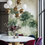 Misty forest wallpaper in master bedroom with minimal furniture and morning light