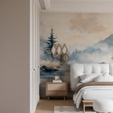 Mountain lake wallpaper in modern living room, showing misty forest scene creating depth