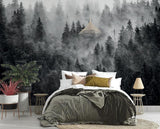 Black and white misty forest wallpaper in cozy bedroom setting with natural light