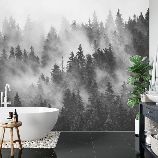 Black and white forest wallpaper creating depth in a minimal Scandinavian living room